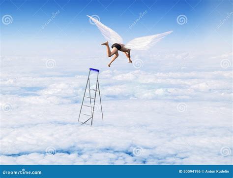 Boy With Angel Wings Flying Jumping From The Stairs In The Sky Stock
