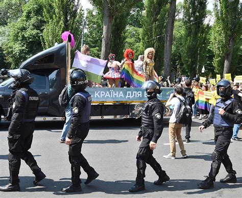 Riot Police Protect Kiev Pride March As Homophobic Protestors Burn Lgbt