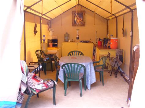 One of the great ways to enjoy the outdoor is through outdoor cooking. scrappin in our camp kitchen tent | Kitchen tent, Tents ...