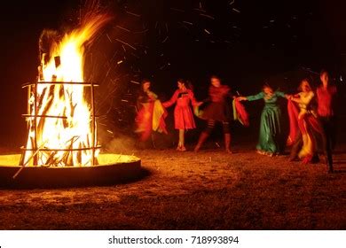 People Dancing Around Campfire Stock Photo Shutterstock