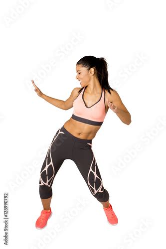 Young Beautiful Latin Woman In Fitness Clothes Dancing Zumba In Aerobic