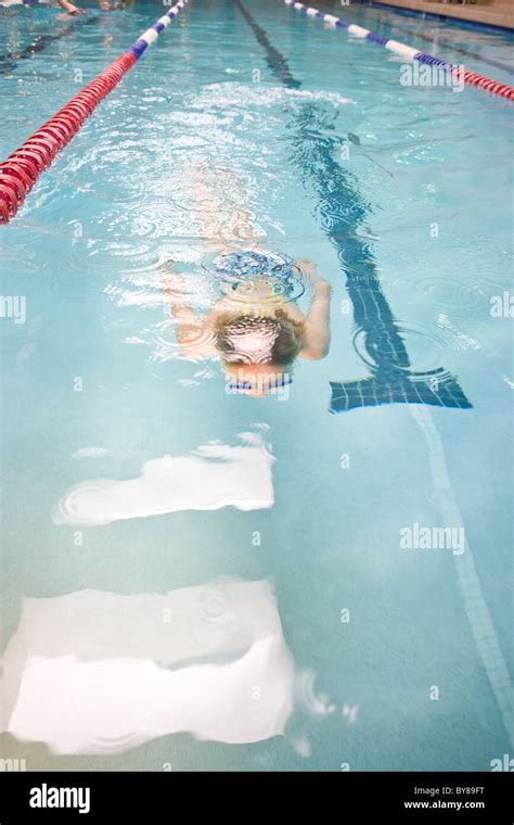 Swimmer Swimming Laps In Gym Pool Stock Photo Alamy
