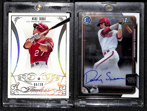 Lot Detail Mike Trout And Dansby Swanson Autograph And Relic Cards