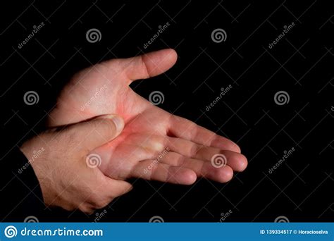 Man`s Hands With Pain In The Palm Of The Hand Massage In The Palm With