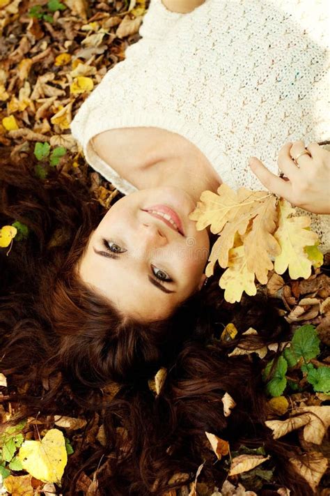 Woman Lying On Autumn Leaves Outdoor Portrait Stock Photo Image Of