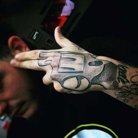 Lista Foto Tatuajes De Pistolas En La Mano El último