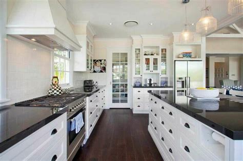 Your dream black and white kitchen, for less 36 Inspiring Kitchens with White Cabinets and Dark Granite ...