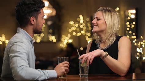 Men Women Talking Meeting Dating At Bar Pub Having Drinks Stock