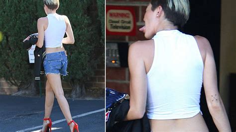 Miley Cyrus Goes Camera Shy As She Heads Into The Recording Studio In