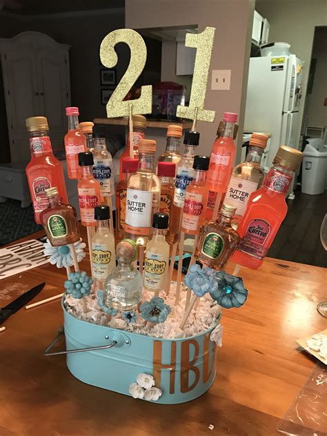 Our distinctive gift baskets and towers are a go to celebration piece any time of the year, that we promise will bring a smile to your recipient's face. 21st birthday liquor bouquet #21 #birthday #alcoholbouquet ...