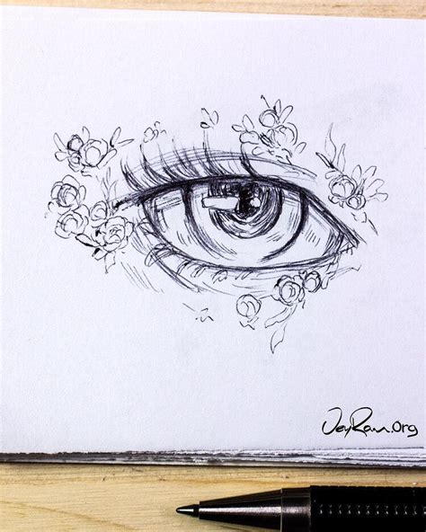 A Pencil Drawing Of An Eye With Flowers Around It