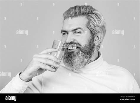 Male Drinking From A Glass Of Water Health Care Concept Photo