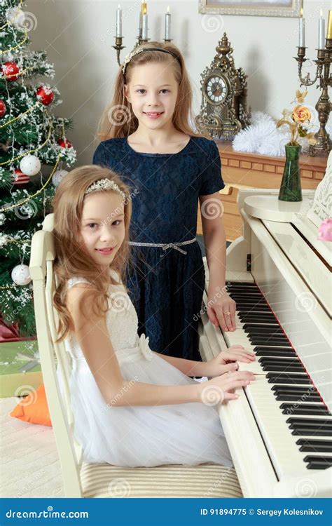 Girls Twins Playing The Piano Stock Image Image Of Childhood Mother