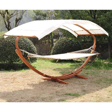 Suncreat's hammock stand weighs 28 pounds and can support up to 275lbs. Outsunny 2 person Wood Swing Arc Hammock Canopy Bed ...