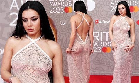 Charli XCX Wears VERY Racy Sheer Gown At The BRIT Awards