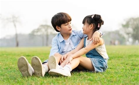 Premium Photo Image Of Brother And Sister Having Fun In The Park