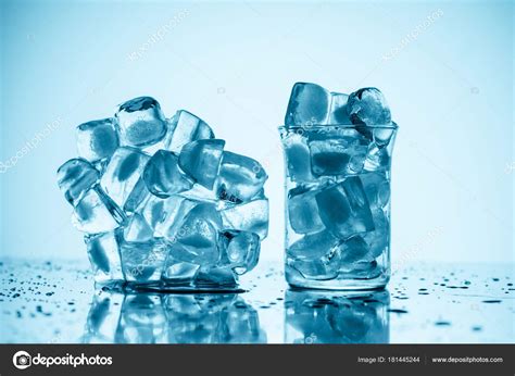 Melting Ice Cubes Glass Glass White Drops Stock Photo By ©vadimvasenin