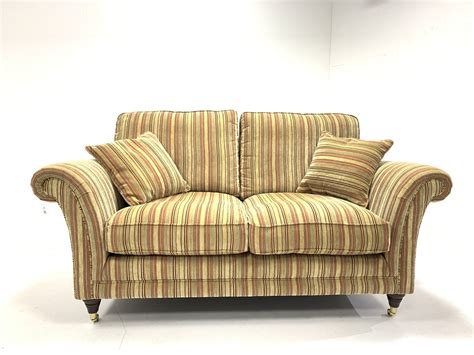 Parker Knoll Burghley Two Seat Sofa Upholstered In Baslow Stripe Gold