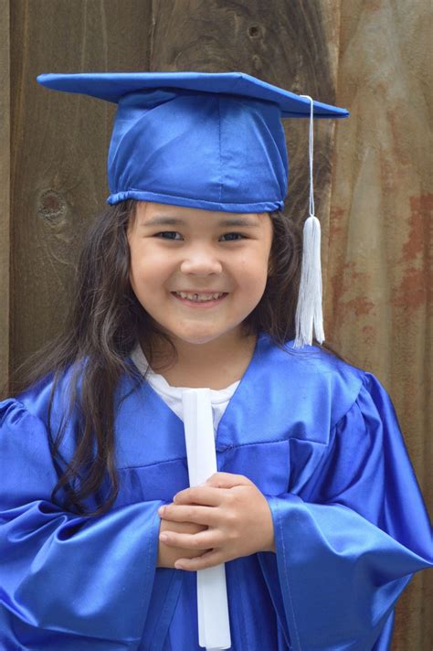 Emma In Her Cap And Gown Preschool Graduation Gown Pictures Cute