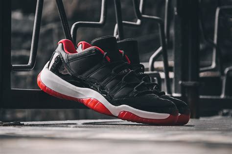 This colorway was spotted on michael jordan's own feet as a pe edition way back in 1996 and remained at an almost legendary status until they finally dropped at retail in summer 2015. Air Jordan 11 Low Bred 2015 - Release Date