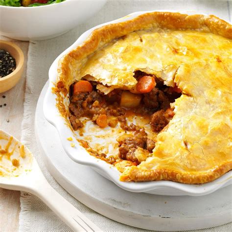 This traditional hot water crust pastry filled with pork shoulder and belly will ensure success. Tasty Meat Pie Recipe: How to Make It | Taste of Home