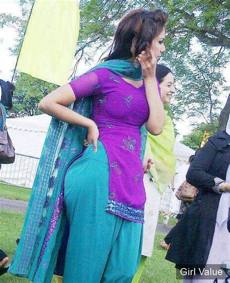 Bold Punjabi Girl In Tight Sky Salwar And Magenta Kameez Dress
