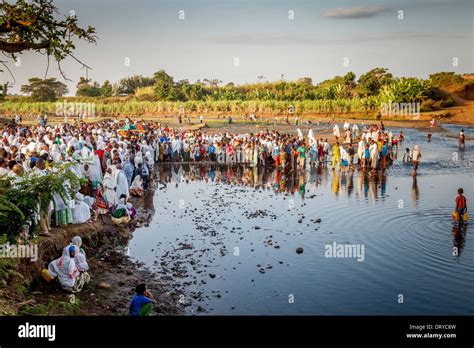 Ethiopian Christians Gather By The Riverside For A Religious Service