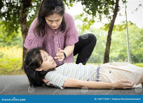 Sick Daughter Is Fainted And Fallen On Floorasian Mother Helptake