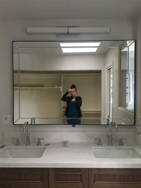 First, a bathroom vanity will generally have a light mounted somewhere above the vanity, typically a foot or two below your ceiling (or at least partway up). Help! light switch and outlet placement in bathroom