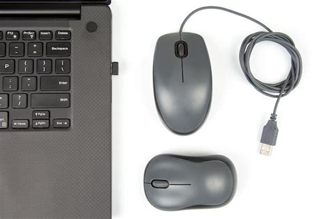 Premium Photo Wireless Mouse And Wired Computer Mouse In Comparison