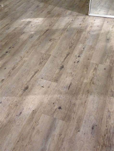 If you want to redo your concrete floors, you can pour an inch or even less, of concrete over your old floors and smooth it out. Cement floors made to look like weathered wood | Cement ...