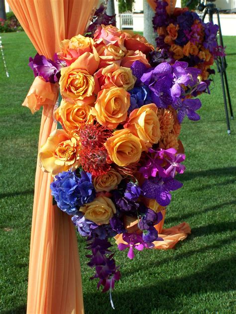 Decorating A Wedding Canopy In Purple And Orange