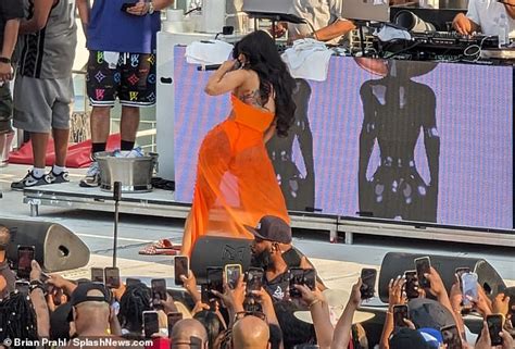Cardi B Throws A Microphone At A Fan Who Hurls A Drink At Her Mid