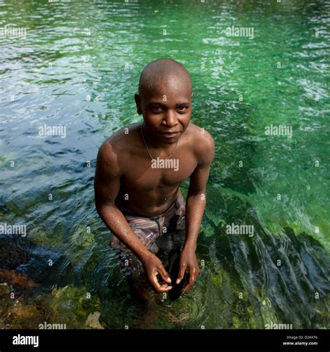 Teenager Boy Having A Bath In A River New Ireland Island Laraibina