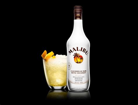 An interesting taste can be obtained by combining coconut liqueur with ice cream or liquid. malibu coconut rum bottle and cocktail beside it