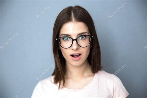 Surprised Young Woman In Glasses — Stock Photo © Vadymvdrobot 68245975
