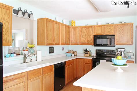 The kitchens with honey oak cabinets are easy to clean and maintain. Kitchen Cabinet Makeover Reveal - Two Twenty One ~ Kitchen ...