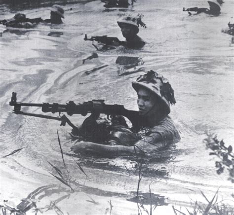 North Vietnamese Soldiers Crossing A River March 1966 Rvietnamwar