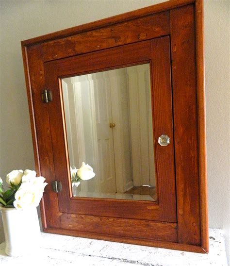 Wood medicine cabinet with mirror. Vintage Medicine Cabinet Beveled Mirror Wooden Surface ...