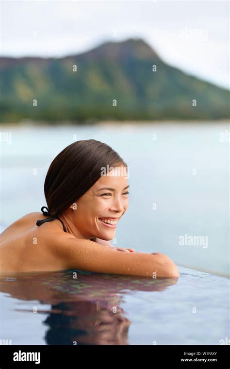 Holiday Woman Swimming At Beach On Hawaii Travel Asian Chinese Young Lady Relaxing In Infinity