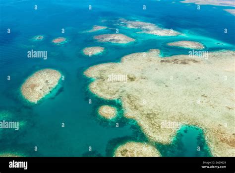 Coral Reefs And Lagoons Top View Atolls And Turquoise Sea Water Sea