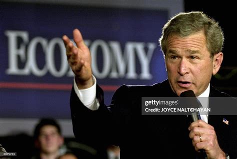 Us President George W Bush Participates In A Conversation On The