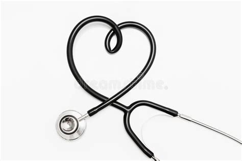 Stethoscope In Shape Of Heart Isolated On White Background With Stock
