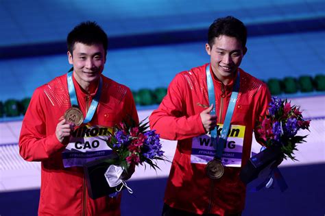 Wang And Cao Hold Off British Challenge To Win First Diving Gold For China