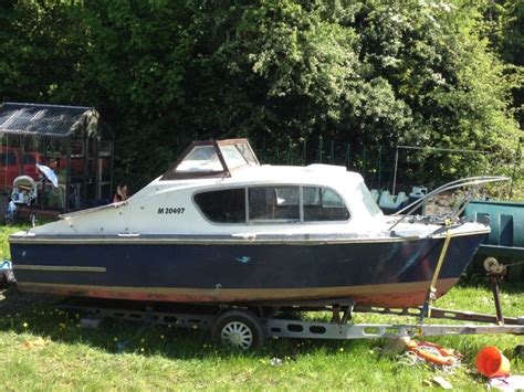 The adults will likely enjoy a more comfortable night's sleep forward. Boat Project Cabin Cruiser Fishing Boat for sale from ...