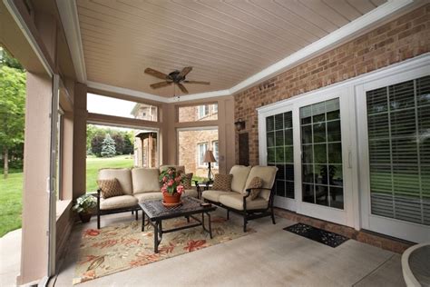 Love this outdoor enclosed patio setting. Enclosed Patio Ideas Mediterranean with Covered Ceiling Black Freestanding Stoves