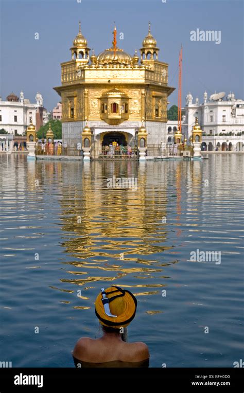 Sikh Pilgrim Bathing In The Sacred Pool Amrit Sarovar The Golden