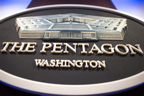 The Pentagon Sign Often Seen Behind The Podium During Media Briefings