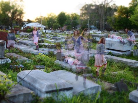 Girl In Pink Dress In Cemetery