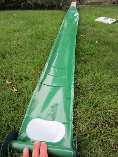 Adds 15 in of downspout length where needed. Raingard fully extended on lawn